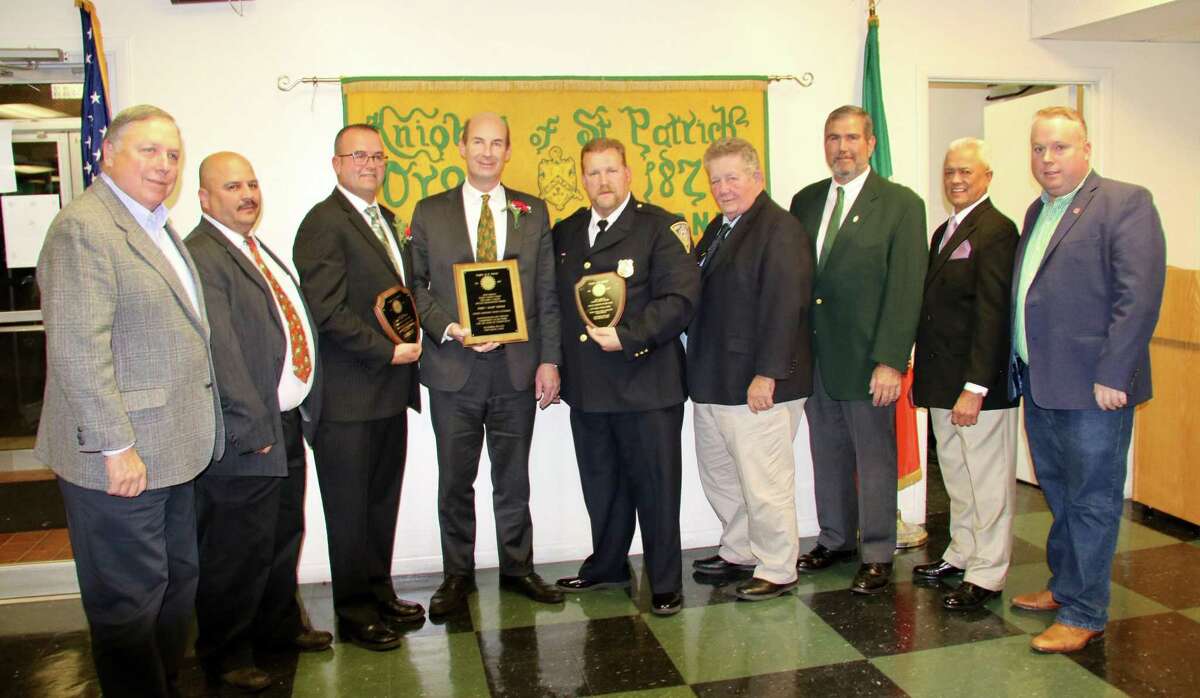 * The Knights of St. Patrick’s recently held the 44th Annual Public Safety Night, held to show appreciation for the public servants who contribute to the safety of the community. From left are committee members Chief Robert Piascyk Jr. (Ret.) RWAPD, Rich Miller NHPD, honorees Capt. Michael Farrell New Haven Fire Dept., Senior Asst. States Attorney John Doyle, Lt. Mark O’Neill New Haven Police Dept., committee members Det. Robert Brooks (Ret.) NHPD, Capt. Seamus Bohan (Ret.) NHFD, Rodney Taylor (Ret.) NHFD and Robert Piascyk III Guilford Fire Dept.