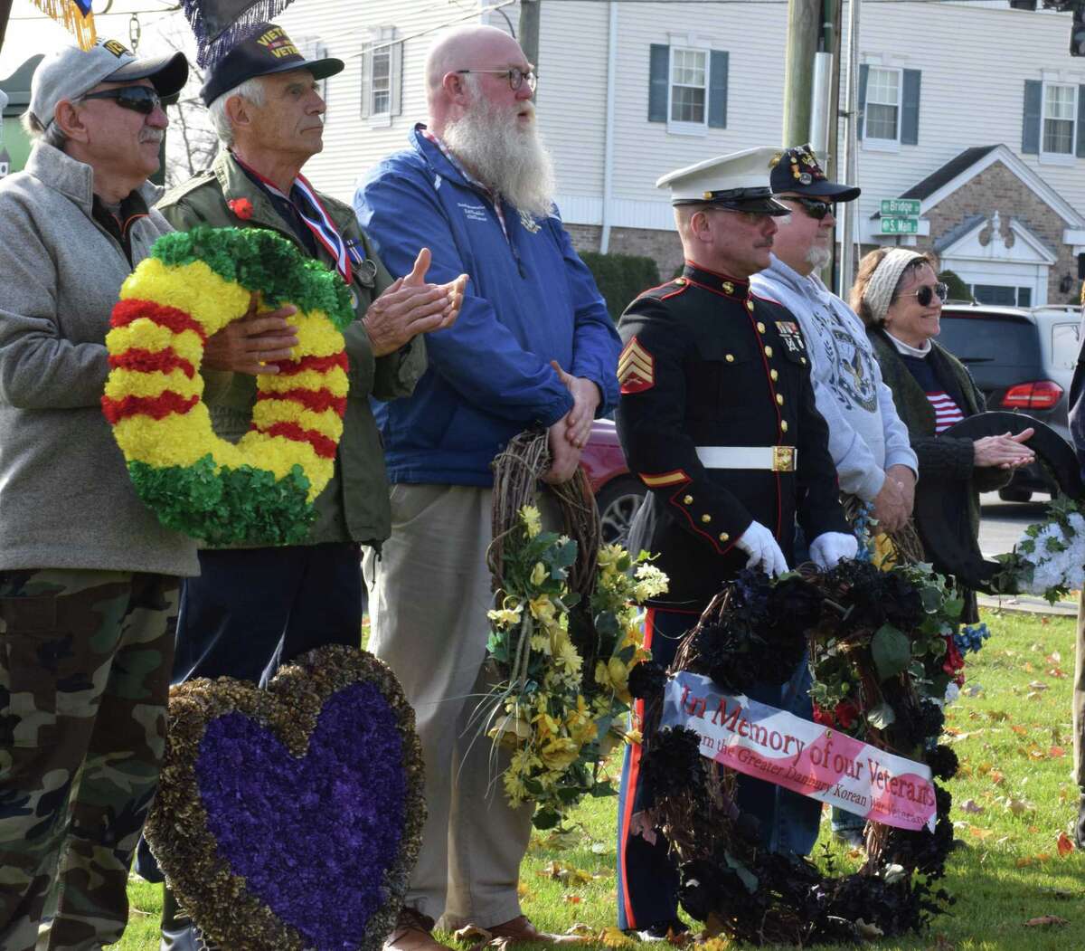 Spectrum/The annual Veterans Day ceremony was held on the south end of the Village Green in New Milford Nov. 11, 2019. Above are wreath bearers, from left to right, Richard Hinlicky, Russell Wheeler, State Rep. Bill Buckbee, Veteran Warren Hengel, Hank Miller and Kathy Shemeley.