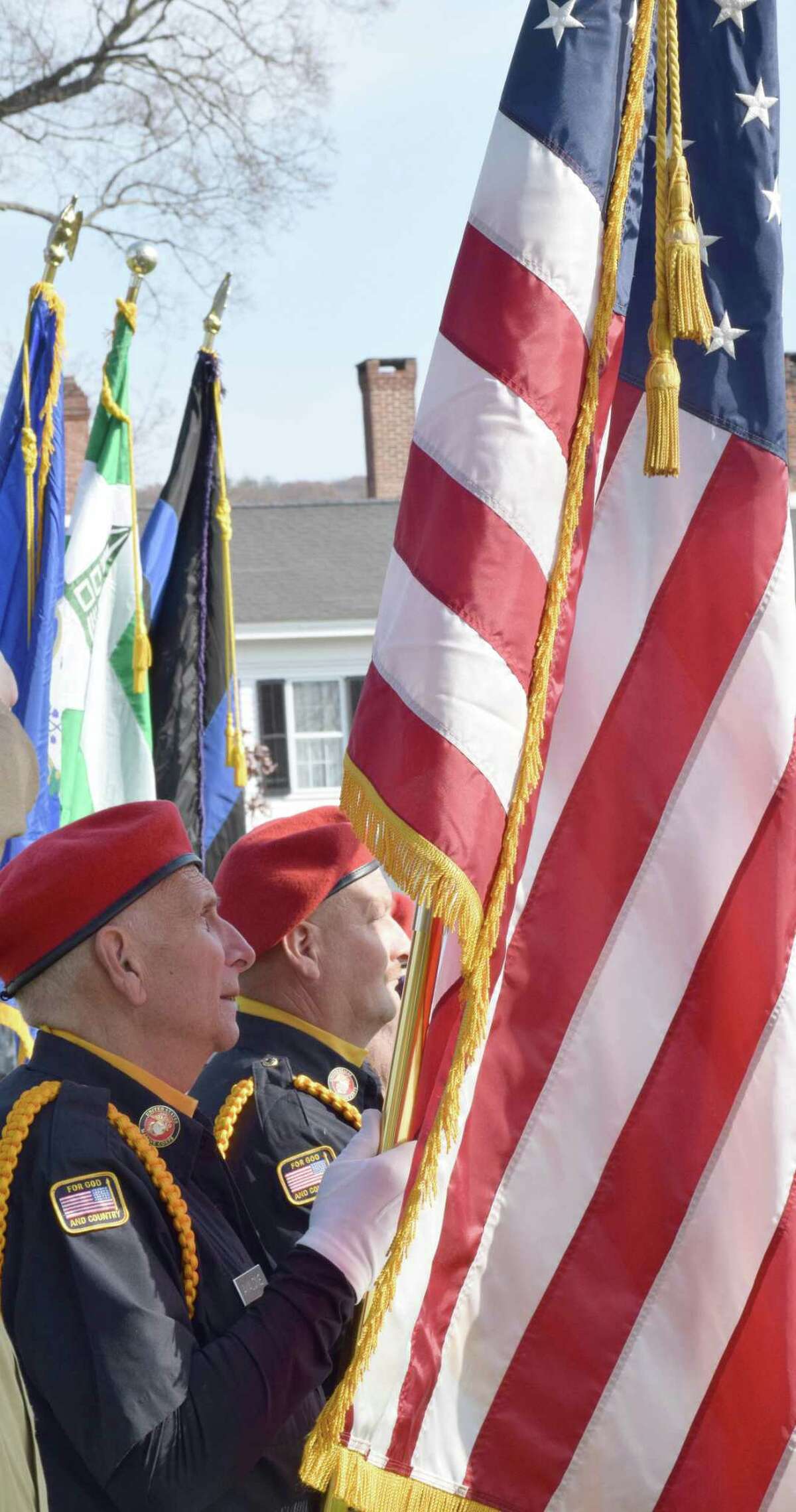 Honor Guard member John Avalone joins others in reflecting on the significance of the day.