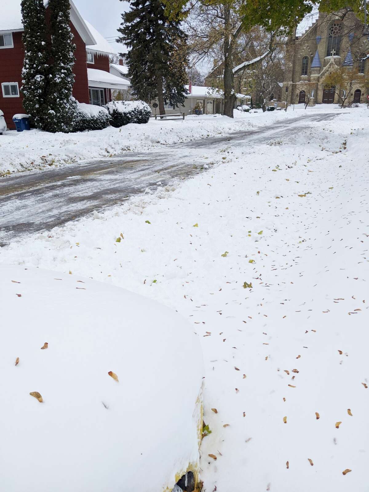 Snowstorm blasts northern Michigan communities