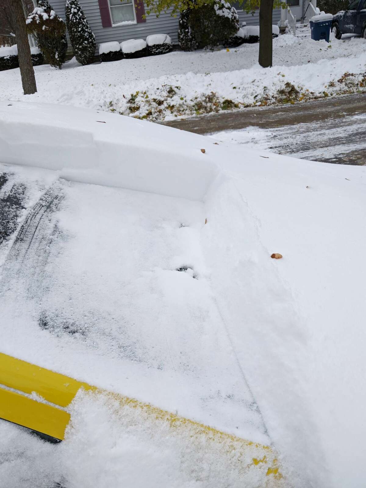 Snowstorm blasts northern Michigan communities