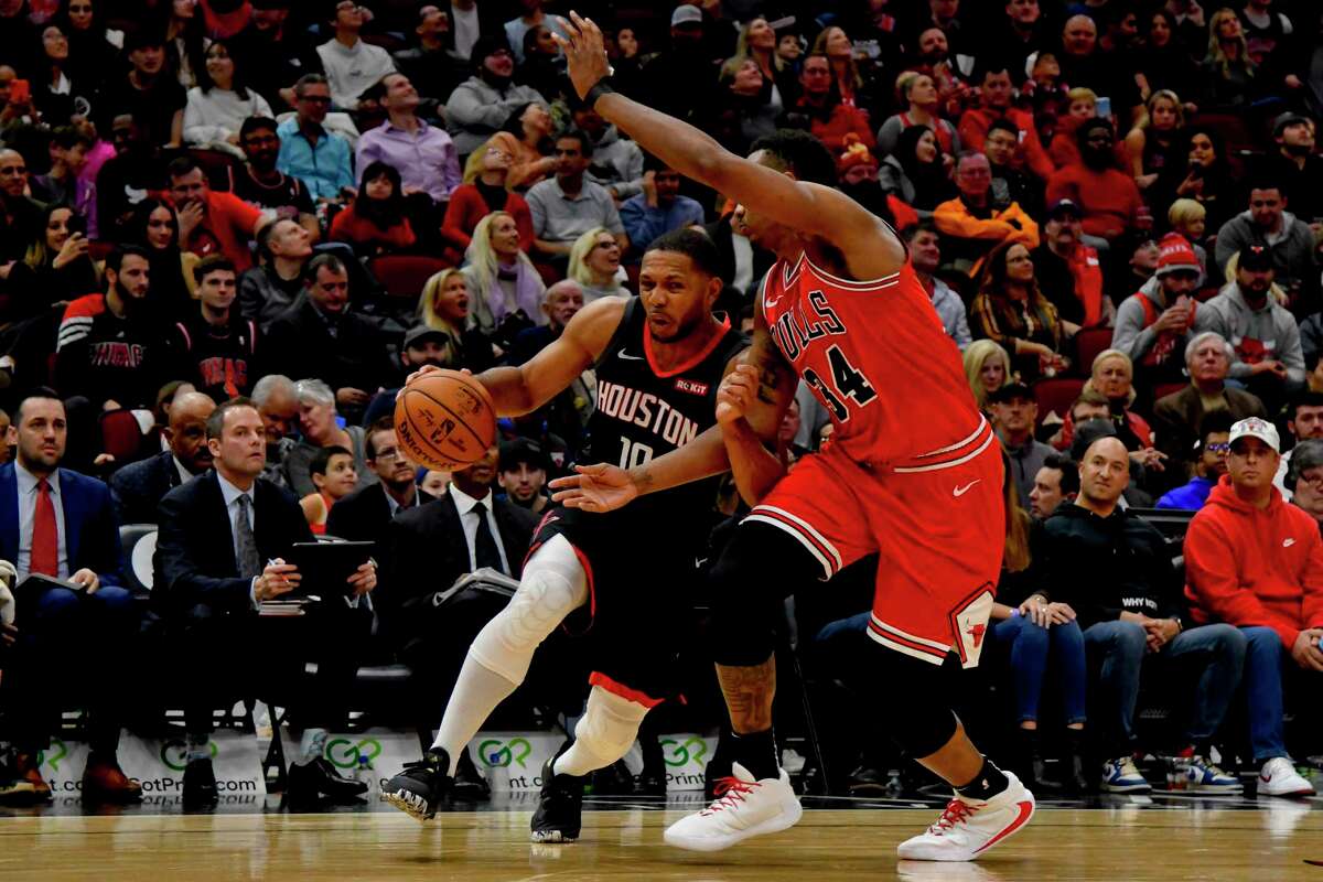 Eric Gordon, driving against Chicago’s Wendell Carter, says he will be more balanced when he comes back from knee surgery.