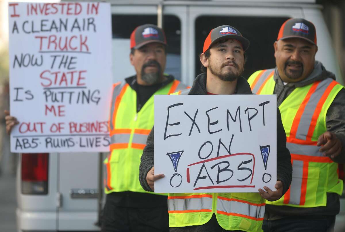 Independent owner-operator truck drivers protest AB5 in front of 455 Golden Gate Ave. on Wednesday, Nov. 6, 2019, in San Francisco, Calif.