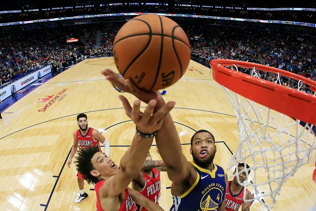 NEW ORLEANS, LOUISIANA - OCTOBER 28: Omari Spellman #4 of the Golden State Warriors fights for a rebound with Jaxson Hayes #10 of the New Orleans Pelicans at Smoothie King Center on October 28, 2019 in New Orleans, Louisiana. NOTE TO USER: User expressly acknowledges and agrees that, by downloading and/or using this photograph, user is consenting to the terms and conditions of the Getty Images License Agreement (Photo by Chris Graythen/Getty Images)