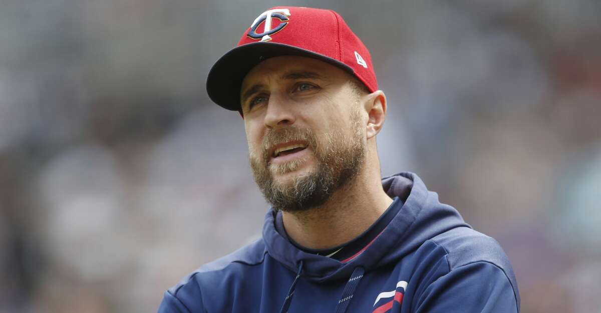 FILE - In this May 11, 2019, file photo, Minnesota Twins manager Rocco Baldelli looks up during the team's baseball game against the Detroit Tigers in Minneapolis. Baldelli has narrowly beaten out Aaron Boone of the New York Yankees to win AL Manager of the Year. (AP Photo/Jim Mone, File)