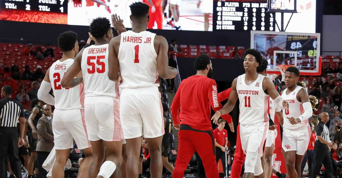 Houston Cougars guard Nate Hinton (11) celebrates with teammates during a timeout during second half of the NCAA basketball game between the Houston Cougars and the Alabama State Hornets at the Fertitta Center in Houston, TX on Tuesday, November 12, 2019.