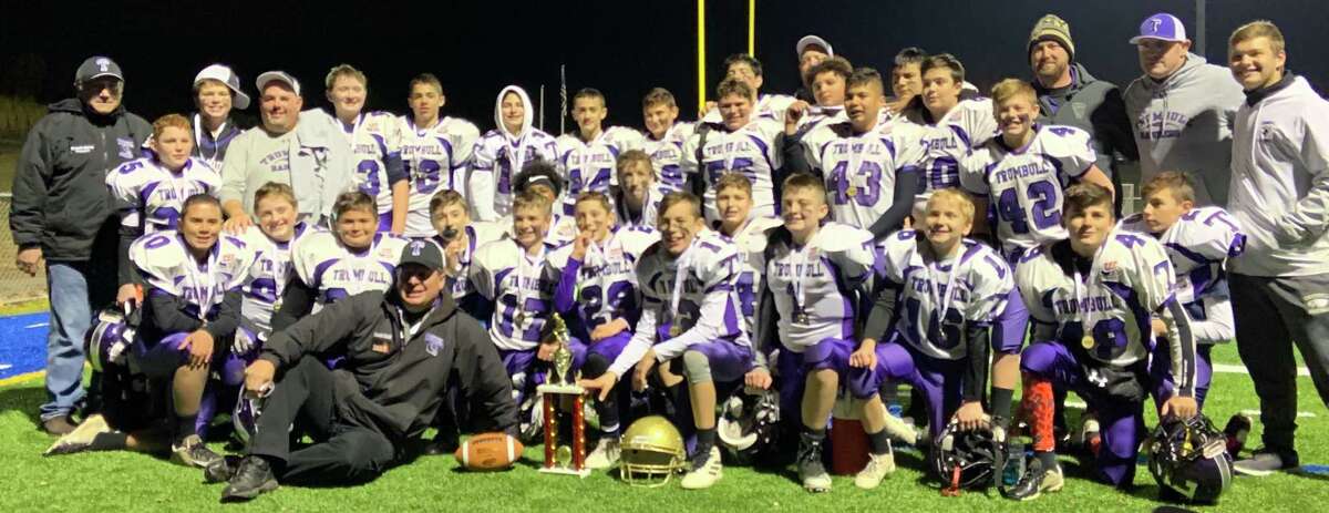 Trumbull Rangers (front row) are: #40 Dante Neri, #38 Shawn Miller, #64 Emmanuel Liriano, head coach Frank Cioffi, #6 Wesley Dayton, #17 Reid McGee, #2 Tyler Lloyd, #29 Collin Gevry, #14 Evan Liguori, #12 Giovanni Winters, #44 Nick Borco, #35 James Paine, #16 Jackson Pond, #49 Brady Smith and #20 Gavin Winters; (second row) League President Gene Cellini, #7 Sean Bertsen, coach Seth Coppola, #63 Owen Swenson, #13 John Martin, #10 Gian Iaquele, #24 Joseph DiMarco, #30 David Delibro, #55 Quinn Polly, #78 Gabriel Orozco, coach Adam Carley, #82 Gabriel Carroll, #43 Chris Contreras, #86 Thomas Sparan, #60 John Tischio, #42 Will Carley, coach David Peterson and coach John Winters and coach Evan Davidson. Missing from photo are coach Rich Andrjewski and team manager Lindsey Carley.