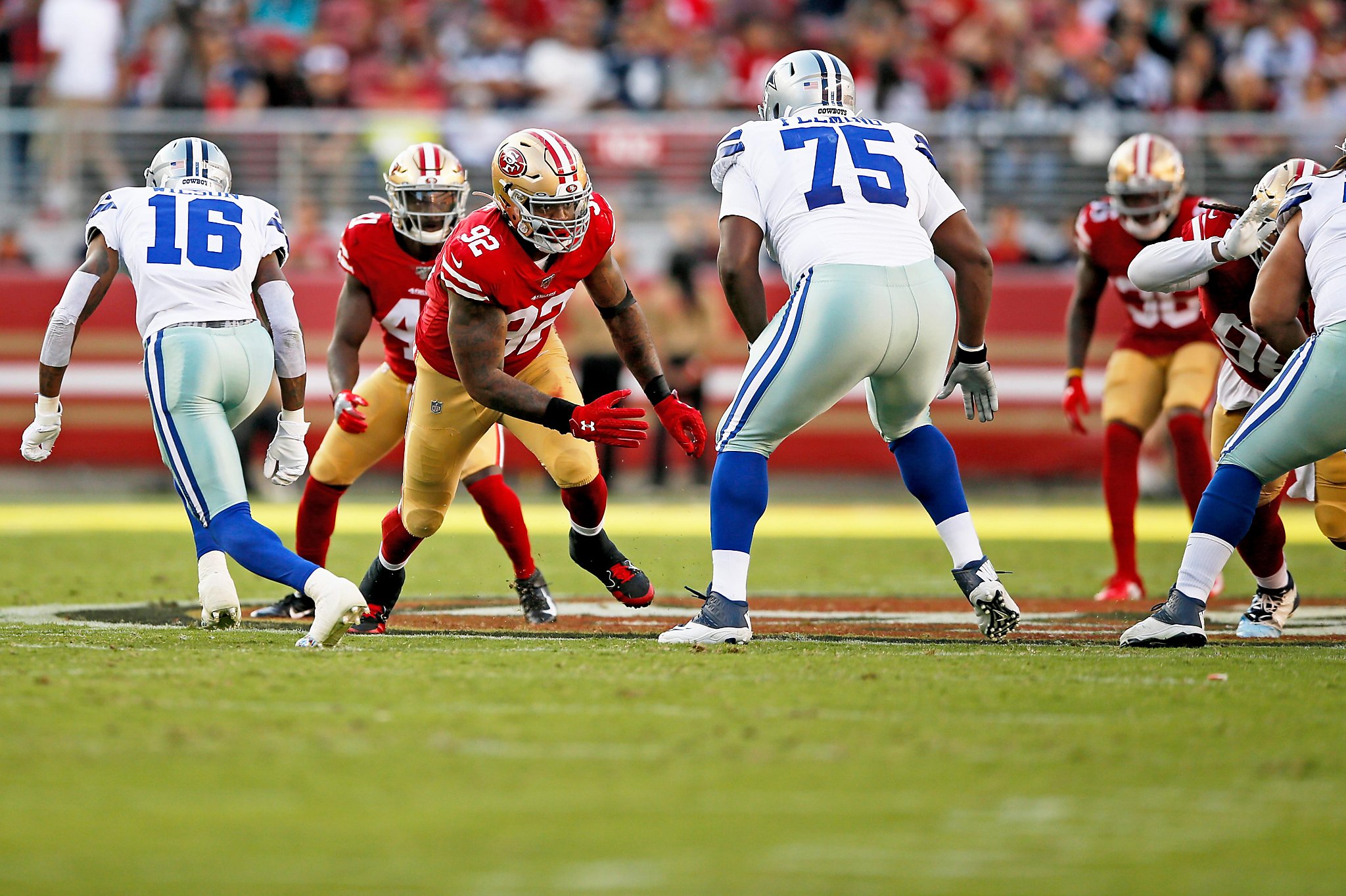 Dallas Cowboys defensive end Damontre Moore, left, and