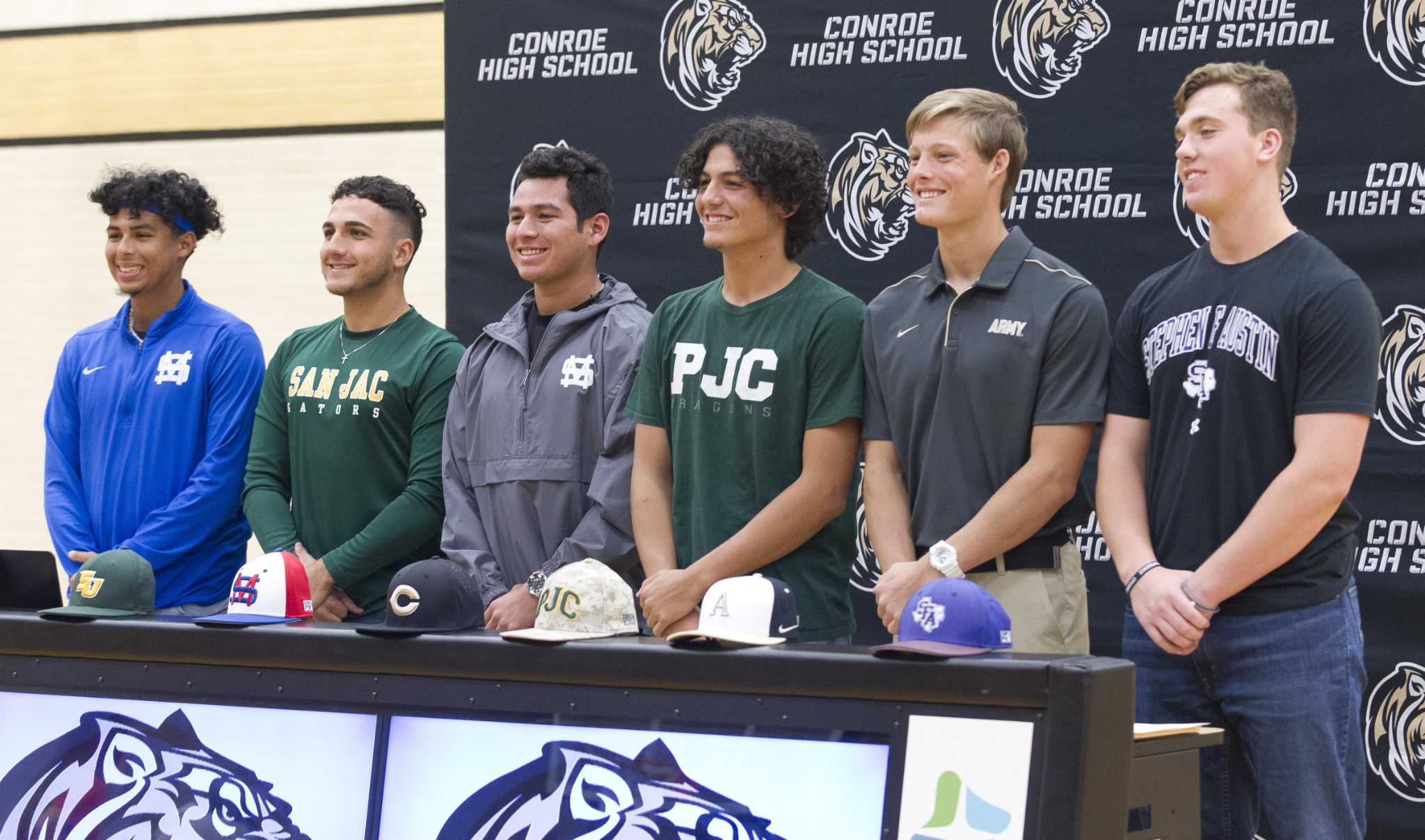 SIGNING DAY: Seven Conroe athletes headed to next level