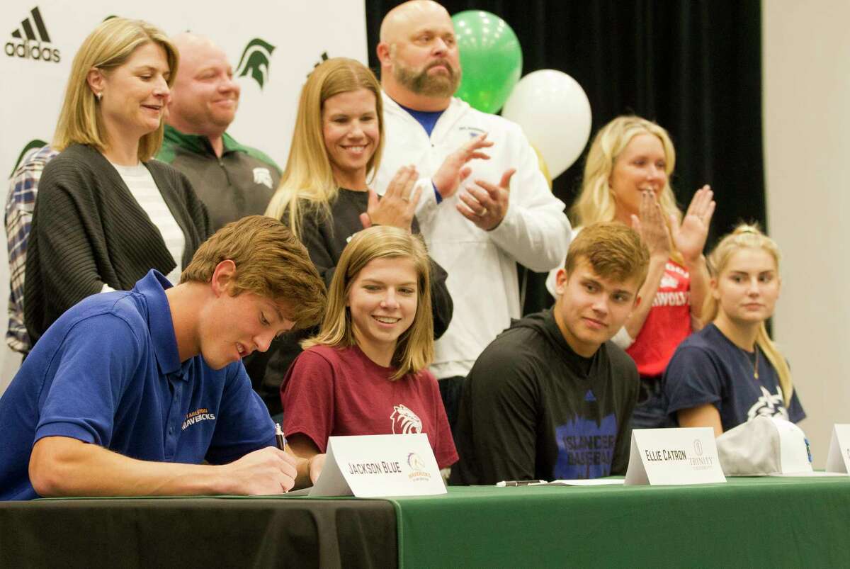 PHOTOS: 2019 Early signing period  Jackson Blue signed to play baseball for UT-Arlington as Ellie Catron, Caden Queck and Caleigh Winbourn look on during a National Signing Day ceremony at The Woodlands Christian Academy, Wedensday, Nov. 13, 2019, in The Woodlands.  >>>See Houston-area athletes make their commitments official during the early signing period ... 