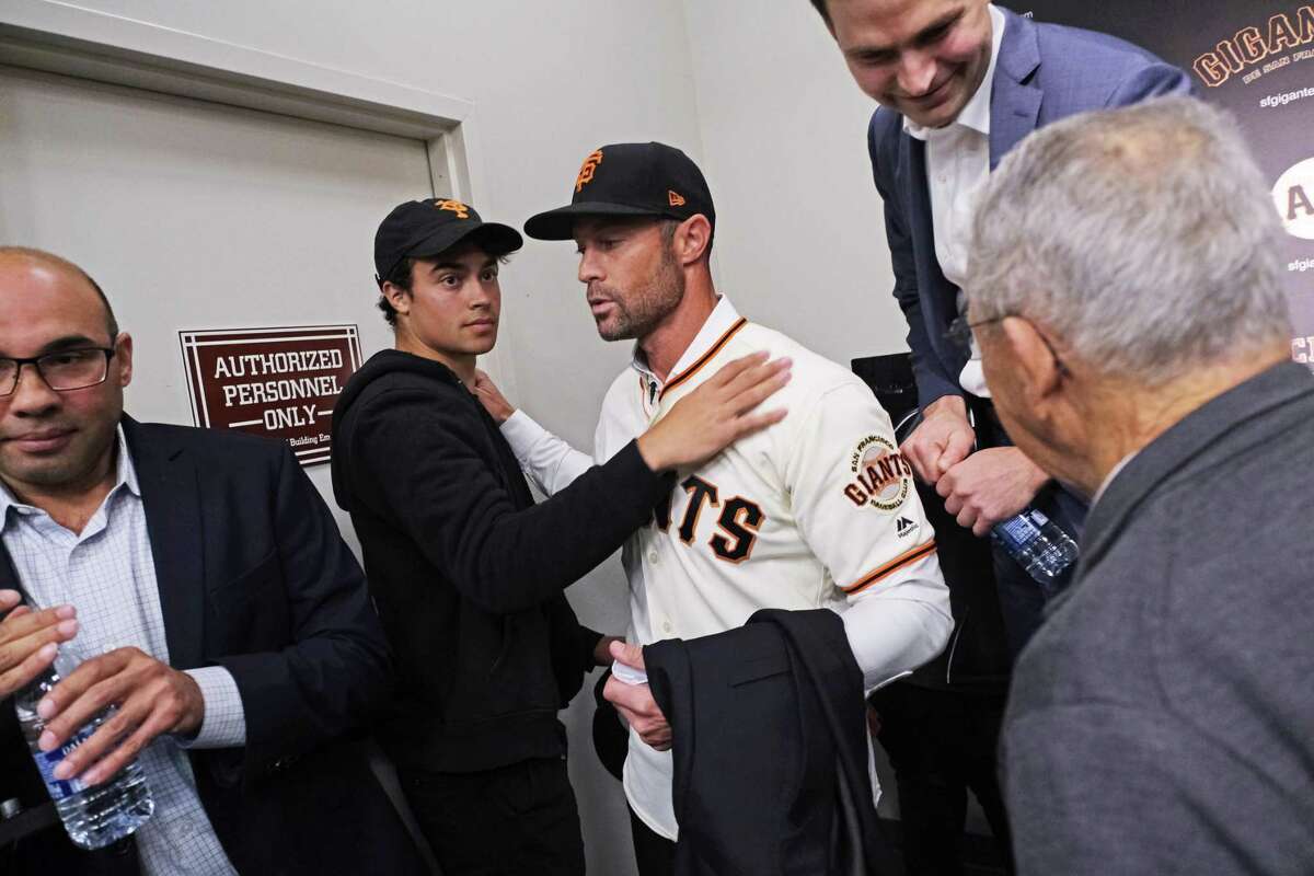 San Francisco Giants new manager Gabe Kapler greets his son after a press conference at Oracle Park in San Francisco, Calif. on Wednesday November 13, 2019.