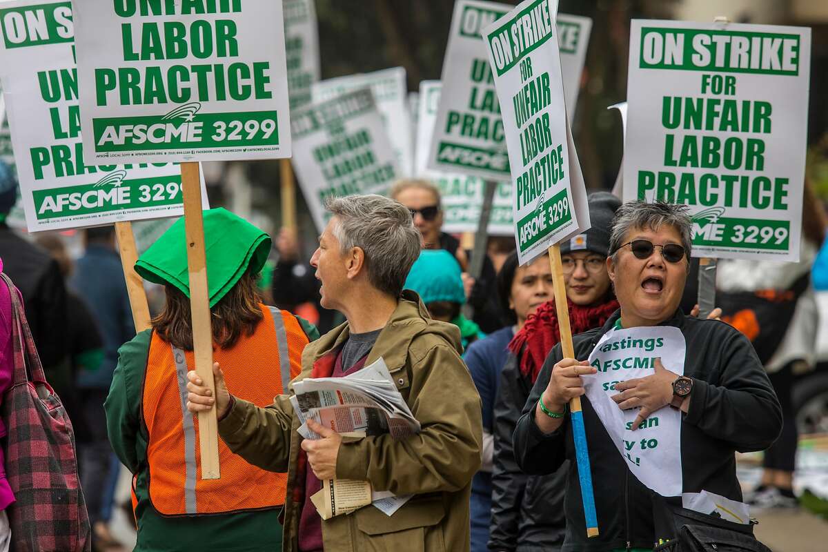 University of California workers hold a one day strike to protest what the workers' union, AFSCME 3299, says are illegal actions by UC to hire cheaper contractors to do their work on Wednesday, November 13, 2019 at UCSF in San Francisco, Calif.