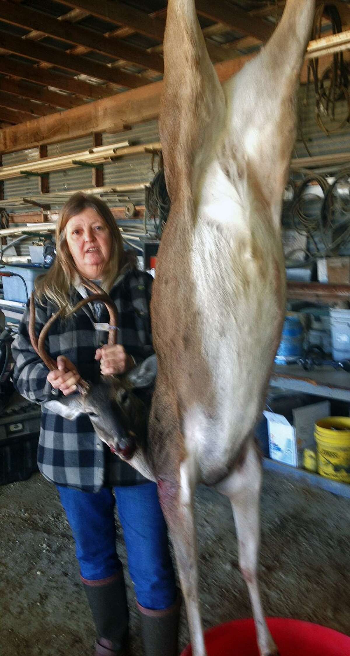 Debbie Ray poses with her ‘cull buck’ trophy she shot on opening morning near Spring Branch that turned out to be a doe with antlers.