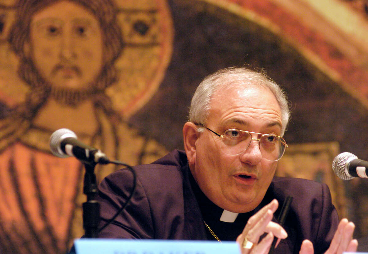 FILE - This Nov. 14, 2007 file photo shows Bishop Nicholas DiMarzio of Brooklyn, N.Y. speaking during a news conference at the U.S. Conference of Catholic Bishops fall meeting in Baltimore. DiMarzio, named by Pope Francis to investigate the churchas response to clergy sexual abuse in Buffalo, New York, has himself been accused of sexual abuse of a child, an attorney for the alleged victim notified the church in November 2019. (AP Photo/ Steve Ruark, File)