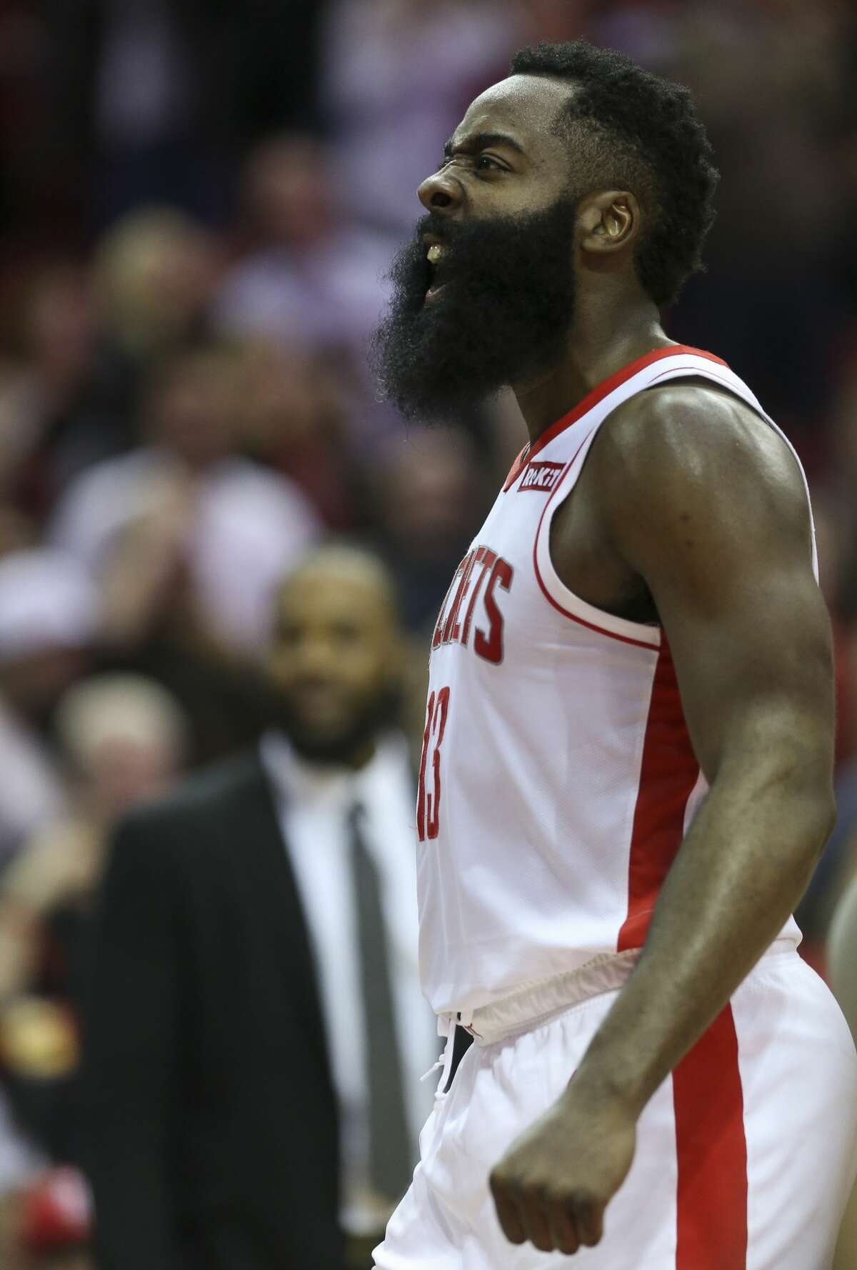 Houston Rockets guard James Harden (13) celebrates after scoring a three-pointer against the LA Clippers during the second half of an NBA game at the Toyota Center Wednesday, Nov. 13, 2019, in Houston.