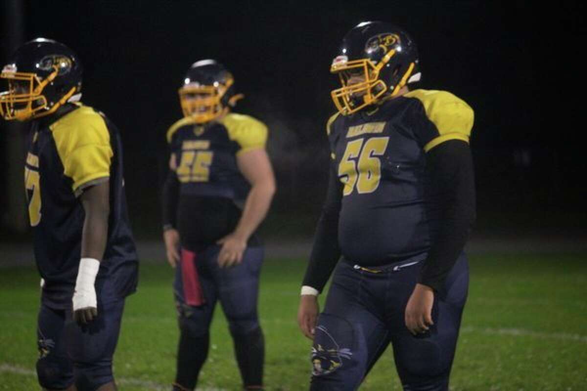 Darrion Hayter (56) was among the West Michigan D League's top linemen this season. (Star file photo)