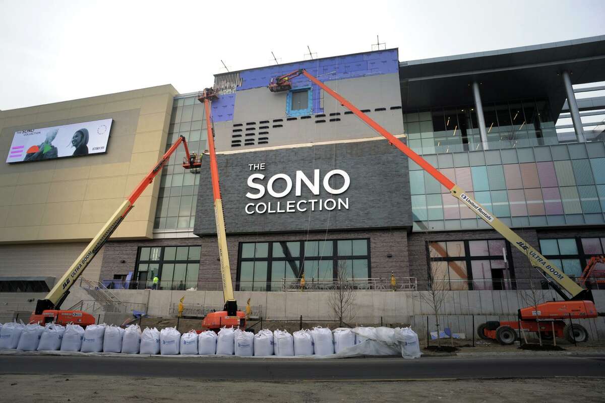 Work continues in mid-November 2019 on the exterior of the SoNo Collection mall in Norwalk, Conn.