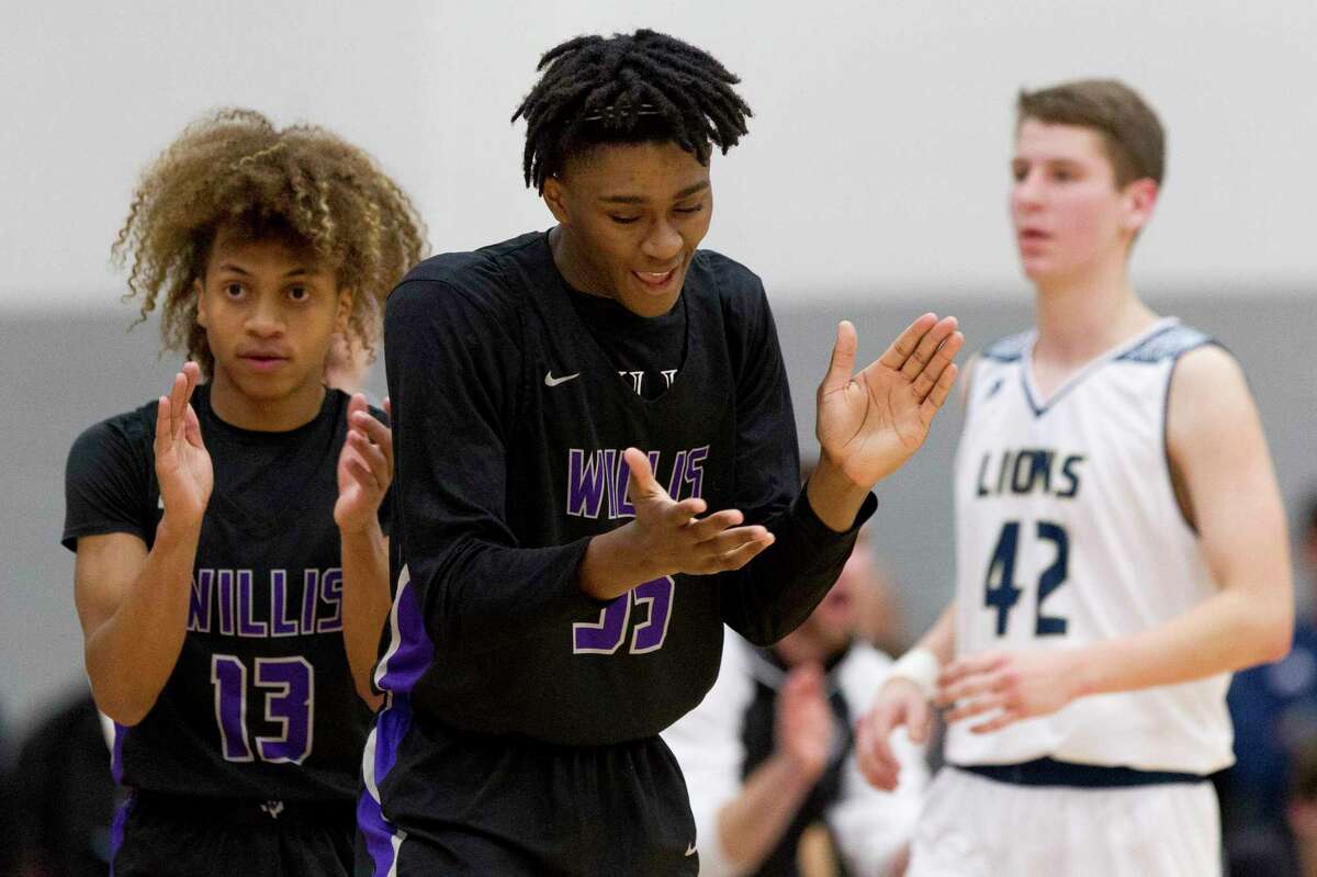 Willis point guard D’Shawn Woods (13) and forward Ja’len Moore (35) react after a Lake Creek turnover during the second quarter of a District 20-5A high school basketball game, Tuesday, Jan 29, 2019, in Montgomery.