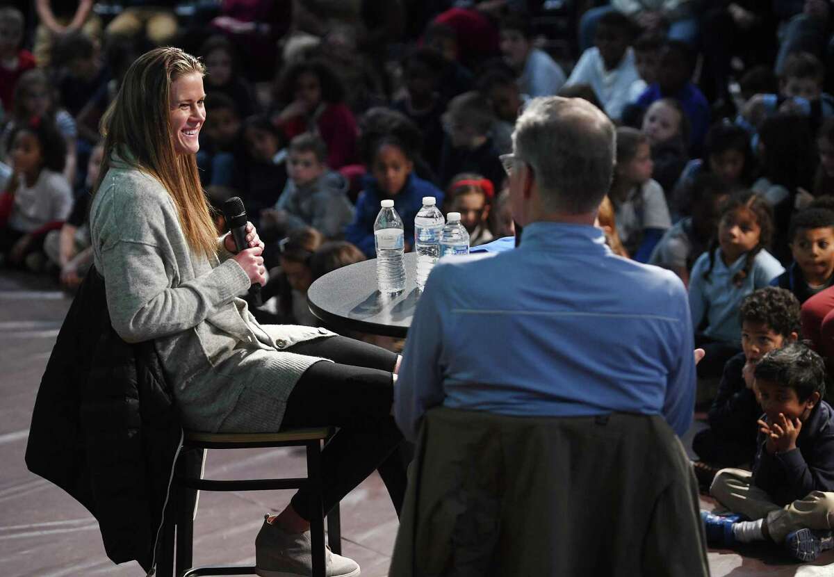 Starting goalkeeper for the United States Women's World Cup Soccer Team Alyssa Naeher, left, is interviewed by sports interviewer Dan Patrick during a visit to her alma mater, Christian Heritage School, in Trumbull, Conn. on Thursday, November 14, 2019.