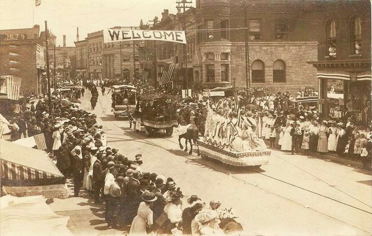 This Fourth of July Parade in Manistee in the early 1900s drew large crowds to the area.