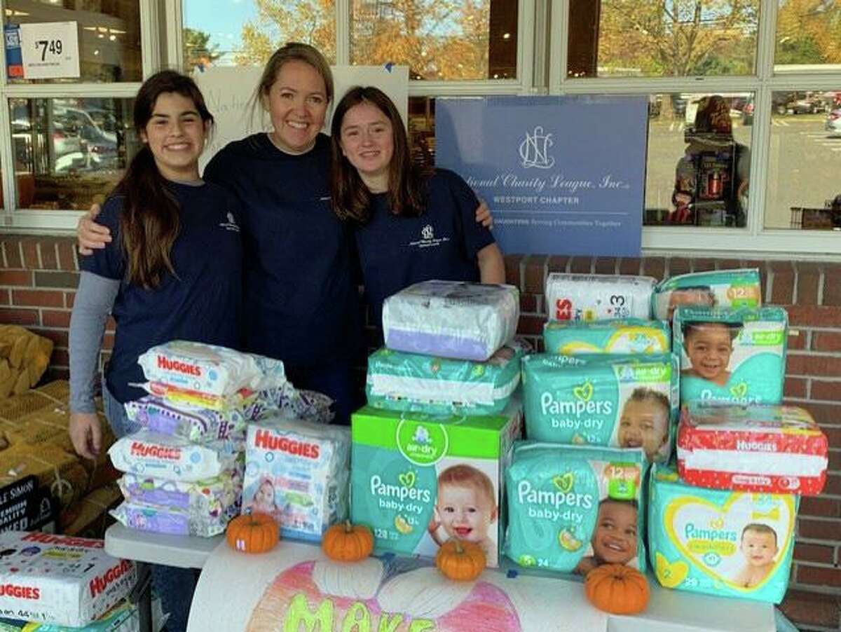Members of the National Charity League, Inc., Westport Chapter, collected diapers outside of Stop & Shop in Westport as part of Make a Difference Day on Oct. 26.