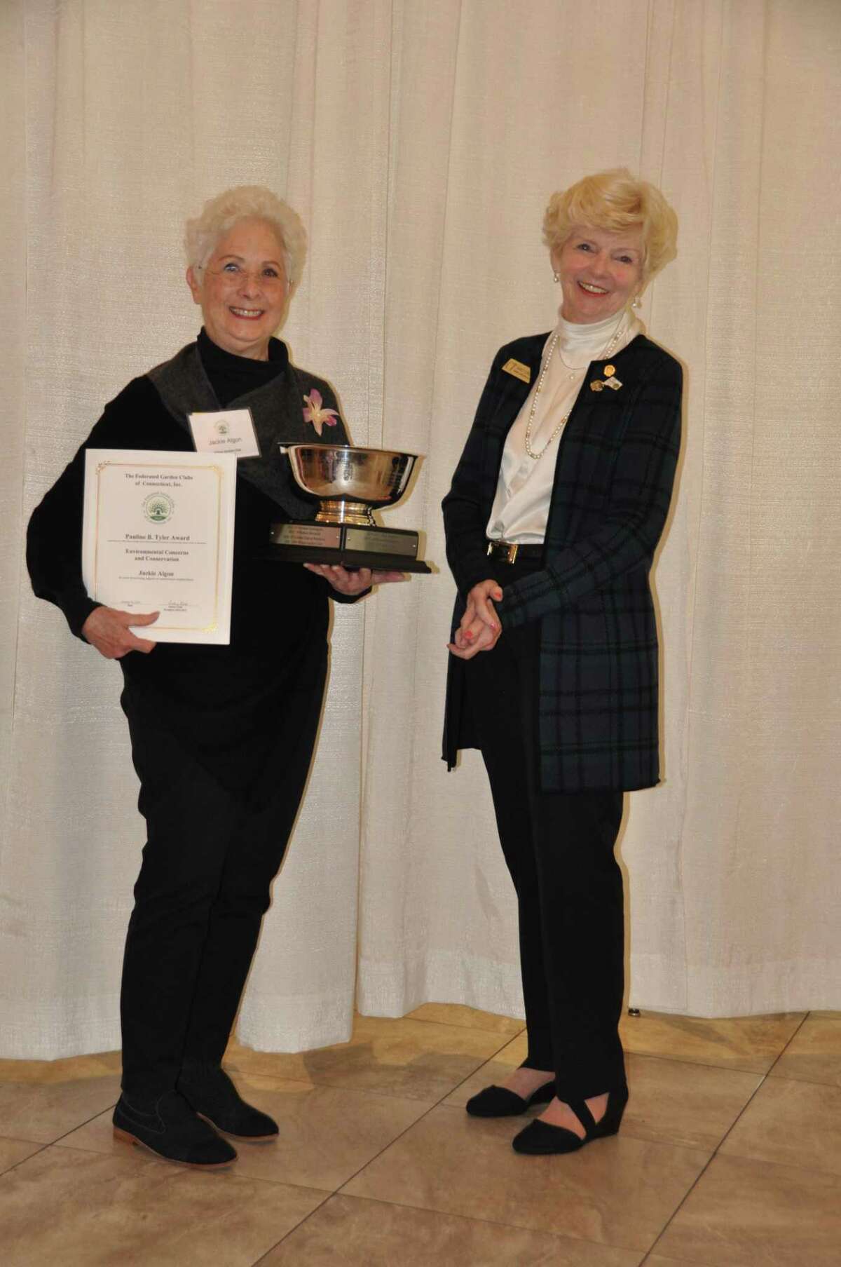 Wilton Garden Club Conservation Chair, Jackie Algon, left, accepts the Pauline Tyler Award — Environmental Concerns and Conservation.