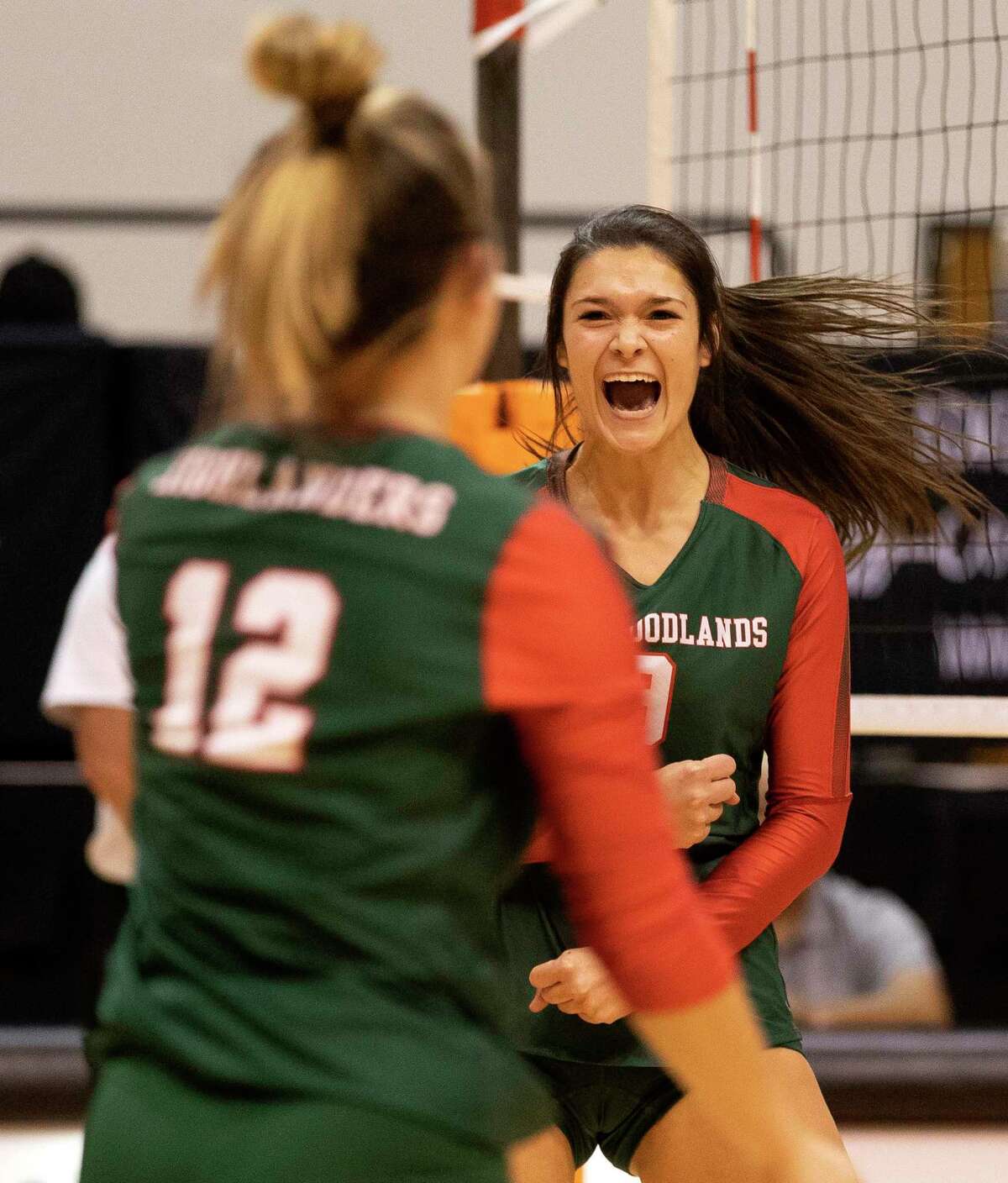 The Woodlands outside hitter Dylan Maberry (9) reacts after a kill shot during the first set of a Region II-6A semifinal volleyball match at Sam Houston State University, Friday, Nov. 15, 2019, in Huntsville.