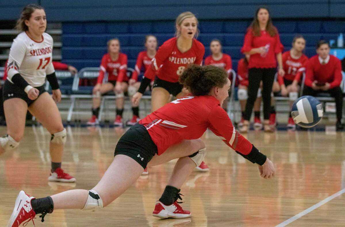Splendora freshman Falon Buford (2) stretches out to save the ball during a Region III-4A semifinal match Friday, November 15, 2019 at Bryan High School.