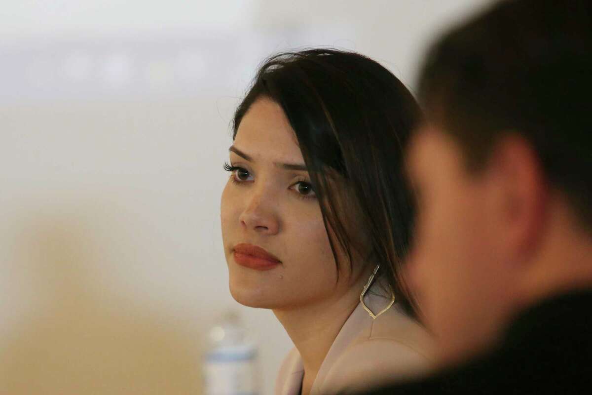 Krista Cooper-Nurse waits to testify in the arbitration hearing of fired San Antonio police officer Justin Ayars, right, on June 26, 2019. Ayars was fired by Police Chief William McManus. Cooper-Nurse alleged Ayars hit her with a rock in May 2018. The attack fractured her face in three different places. He was fighting to get his job back.