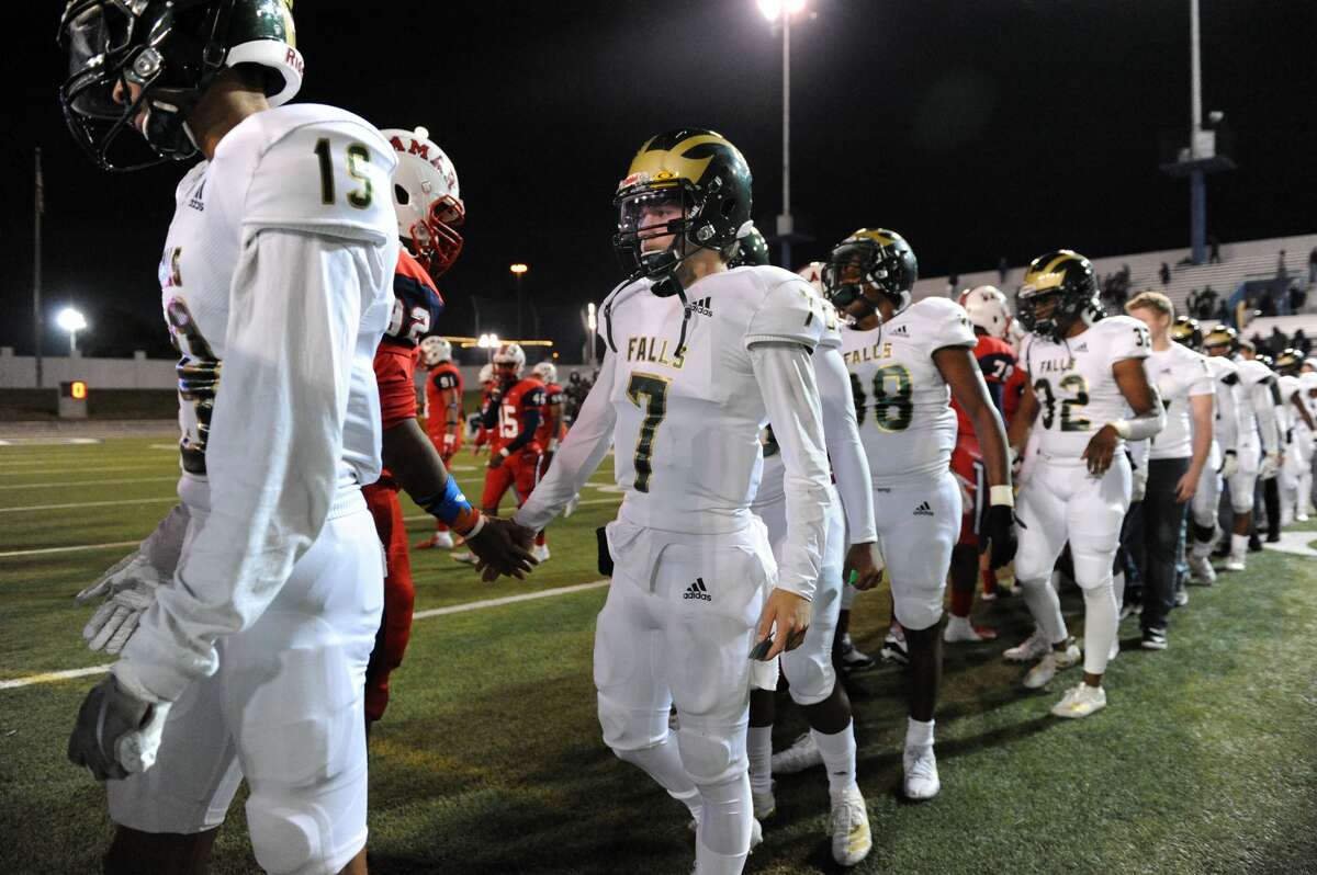 PHOTOS: Cy Falls 27, Lamar 14 Cy Falls Eagles shake hands with Lamar Texans after a Class 6A Division I Region III bi-district football playoff game on Friday, November 15, 2019 at Delmar Stadium, Houston, TX.