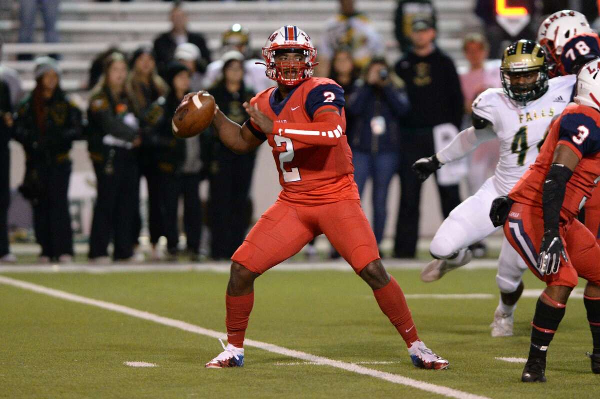 Troy Tisdale (2) of Lamar prepares to release a pass during the first quarter of a Class 6A Division I Region III bi-district football playoff game between the Lamar Texans and the Cy Falls Eagles on Friday, November 15, 2019 at Delmar Stadium, Houston, TX.