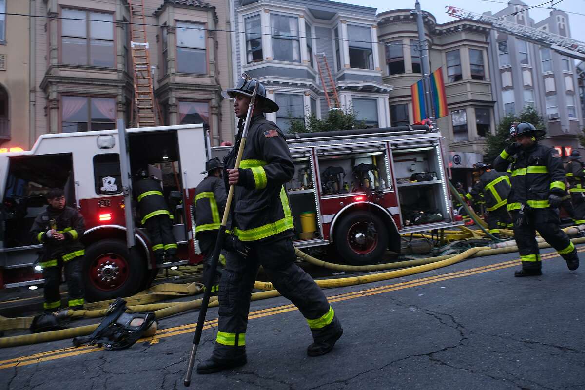 San Francisco firefighters battled a blaze early Saturday in two adjoining buildings in the Castro District in San Francisco, Calif. on Saturday November 16, 2019.