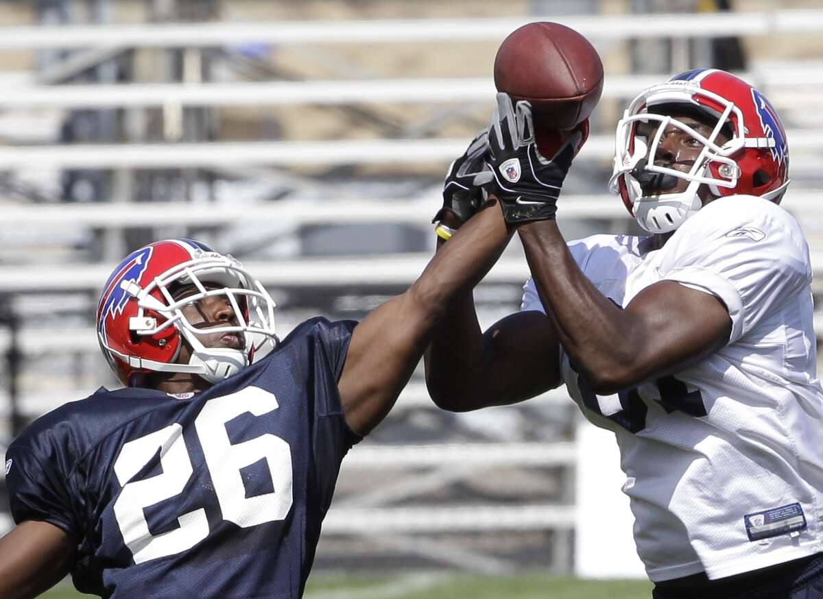 Buffalo Bills' Ashton Youboty (26) breaks up a pass intended for Marcus Easley (81) during NFL football training camp in Pittsford, N.Y., Friday, July 30, 2010. (AP Photo/ David Duprey)