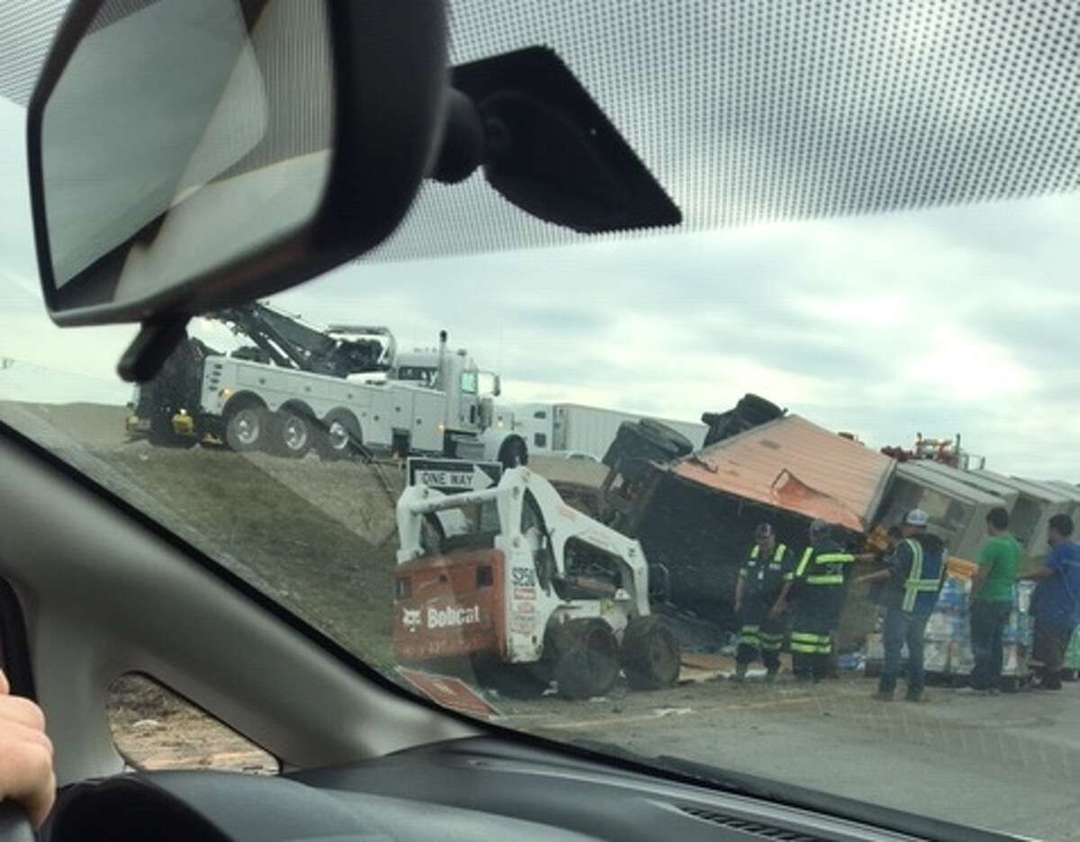 An overturned 18-wheeler on Interstate 35 in San Marcos closed lanes of the highway and caused an hours-long traffic jam Sunday.