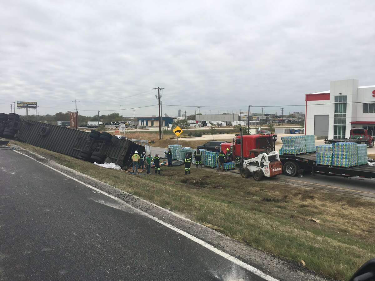 An overturned 18-wheeler on Interstate 35 in San Marcos closed lanes of the highway and caused an hours-long traffic jam Sunday.