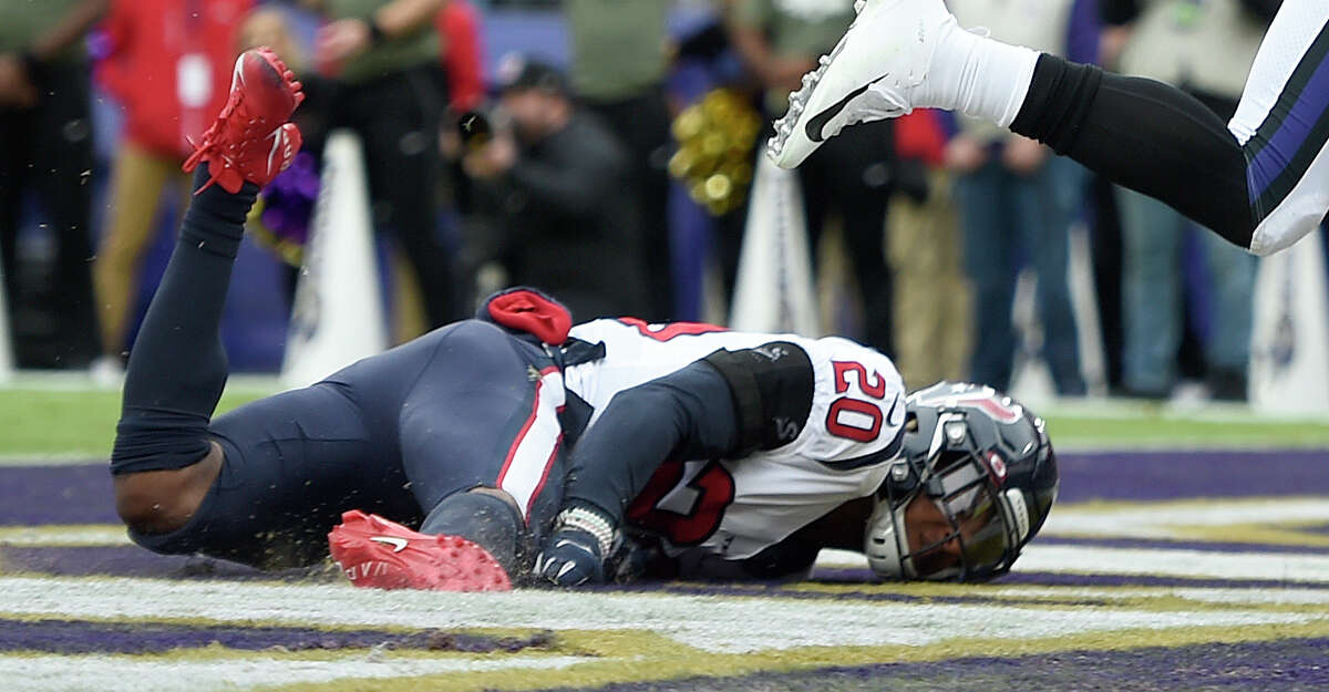 Houston Texans strong safety Justin Reid (20) falls while trying to make a diving stop in the end zone during the first half of an NFL football game, Sunday, Nov. 17, 2019, in Baltimore. (AP Photo/Gail Burton)
