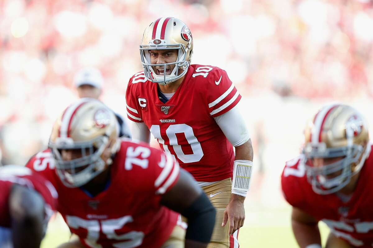 Quarterback Jimmy Garoppolo #10 of the San Francisco 49ers prepares to snap the football against the Arizona Cardinals during the first half of the NFL game at Levi's Stadium on November 17, 2019 in Santa Clara, California. (Photo by Lachlan Cunningham/Getty Images)
