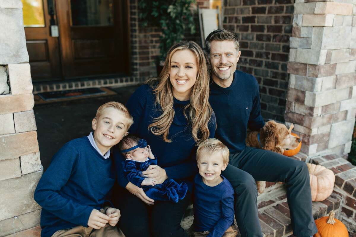 Inside Edition correspondent Megan Alexander welcomes the new addition to her family, Capri Mabel Cournoyer. Pictured is her husband Brian and their two sons, Chace (left) and Catcher (right).