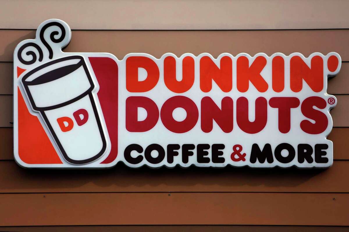 The Dunkin’ coffee chain says customers will have to do without a “double cup” for their iced drinks. (AP Photo/Gene J. Puskar, File)