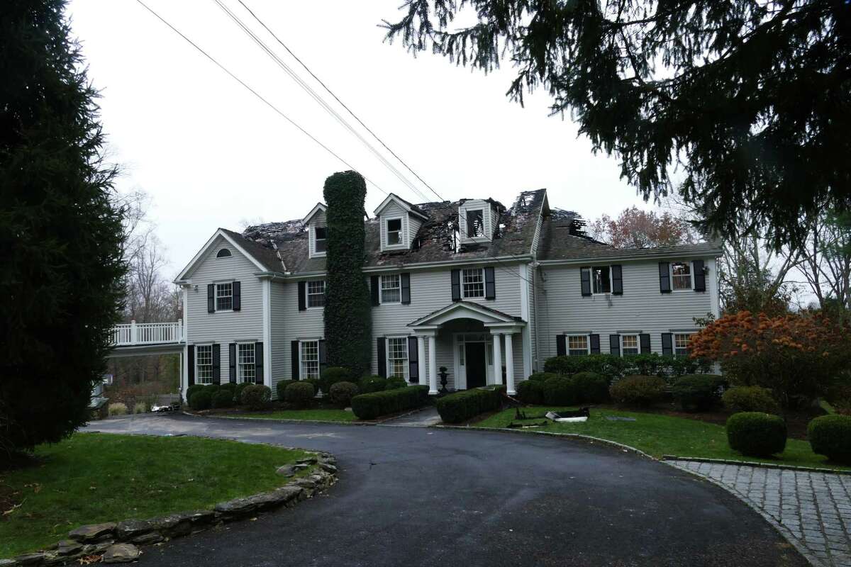 Fire rips through New Canaan home