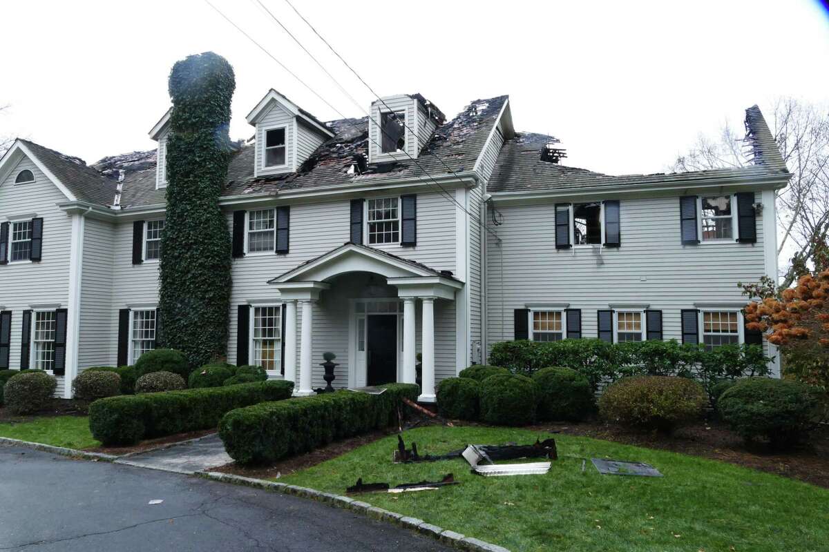 Fire rips through New Canaan home