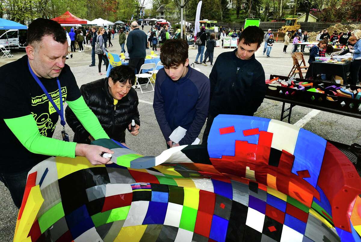 Greens Farms Academy Director of Technology Jesse Robinson gets help from Sunrise Rotarian Sheila Keenan and visitors Jonah Halperin and Niels Bantitbergenas to assemble The Great Duck Project, sponsored by Westport Sunrise Rotary Club, during the 8th annual Maker Faire Westport this past April. The 9th annual edition has been renamed Maker Faire Connecticut to reflect its growing size and impact, and will take place next year over two days - Saturday and Sunday, April 18 and 19, 2020 - at Staples High School in Westport.