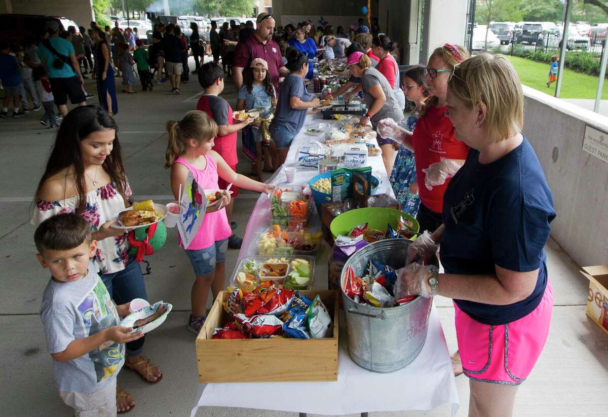 The new Ready Rosie toolkit gives parents guidance about talking to your child before, and after, the storm, to mitigate possible trauma. Hundreds of residents affected by Hurricane Harvey were provided a free meal at Sam K. Hailey Elementary School, Wednesday, Aug. 30, 2017, in Spring.