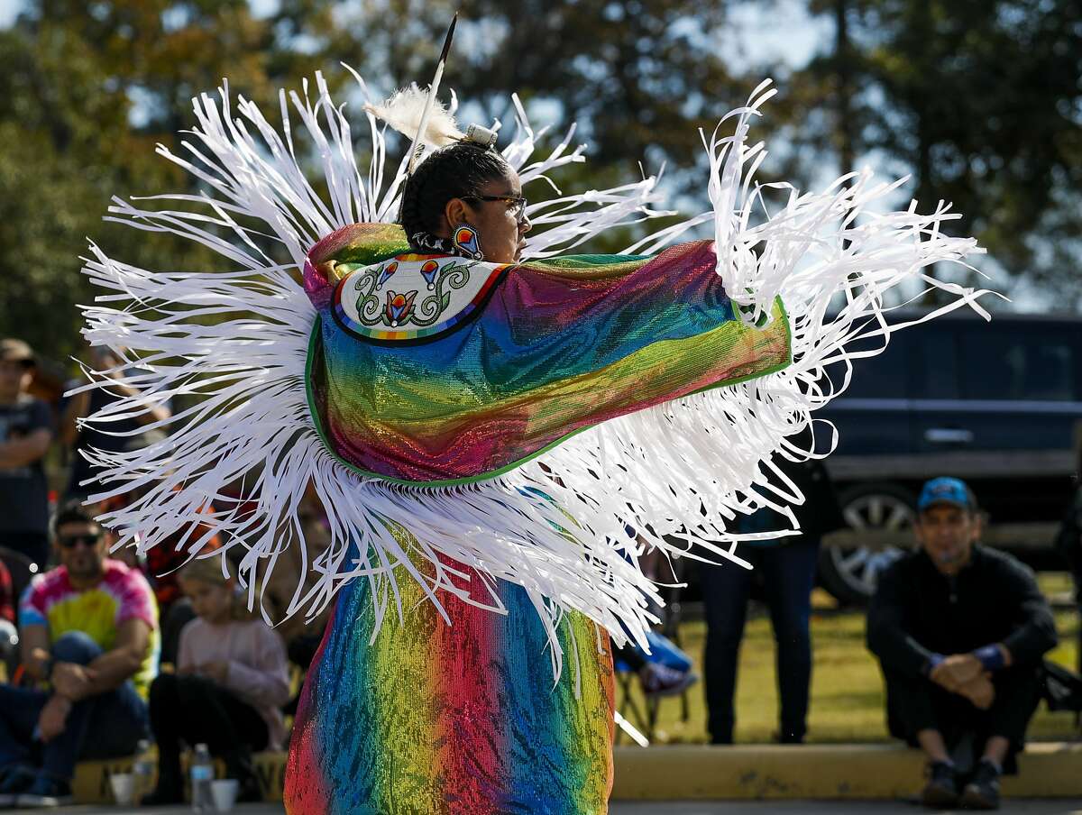Julianne Butler performs a ceremonial dance, used in time of war, as members of the Alabama-Coushatta perform dances and talk about the tribe’s history at the Heritage Museum of Montgomery County, Saturday, Nov. 16 2019, in Conroe.