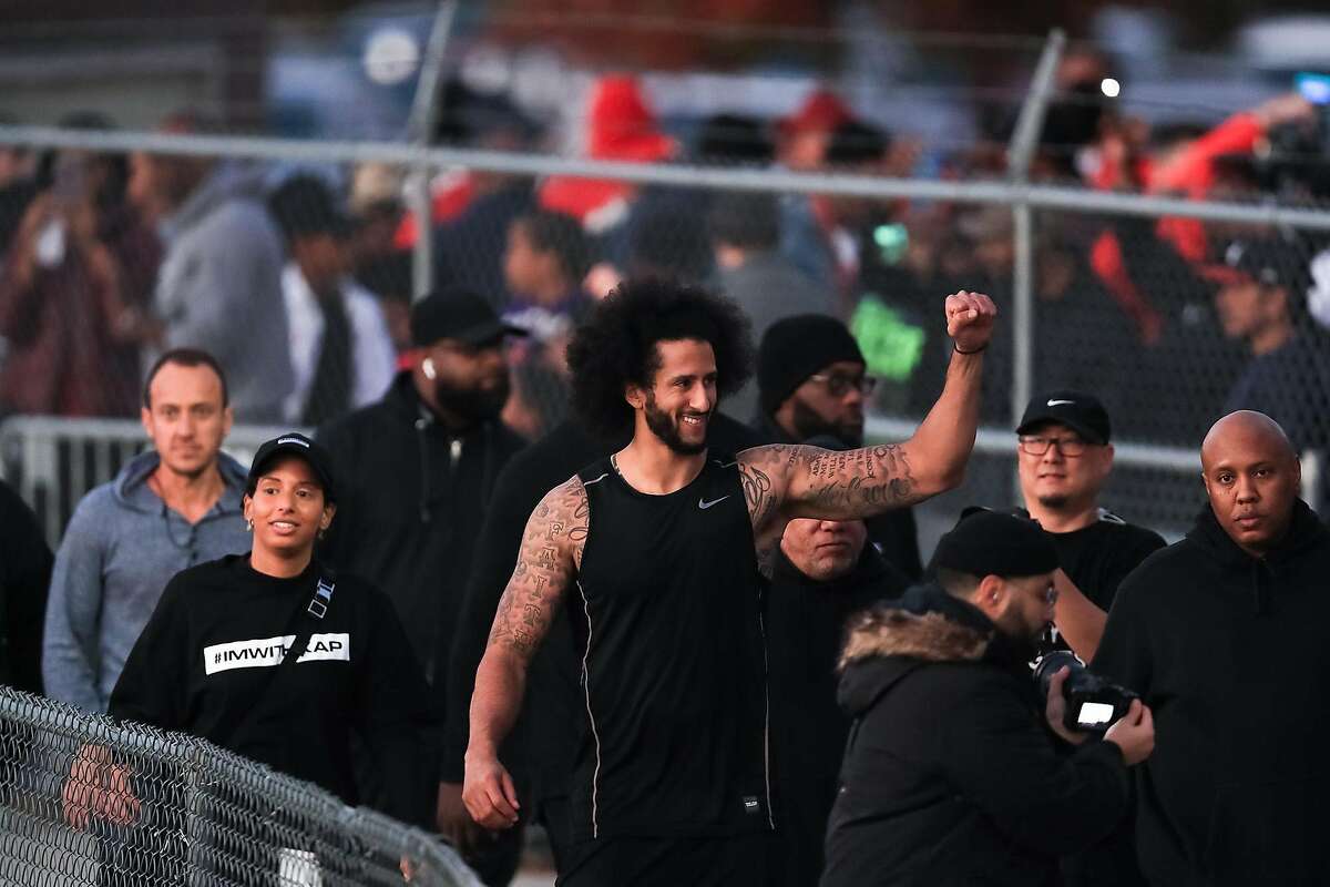 Colin Kaepernick visits with fans following his NFL workout held at Charles R. Drew High School on Saturday, Nov. 16, 2019 in Riverdale, Ga. (Carmen Mandato/Getty Images/TNS)