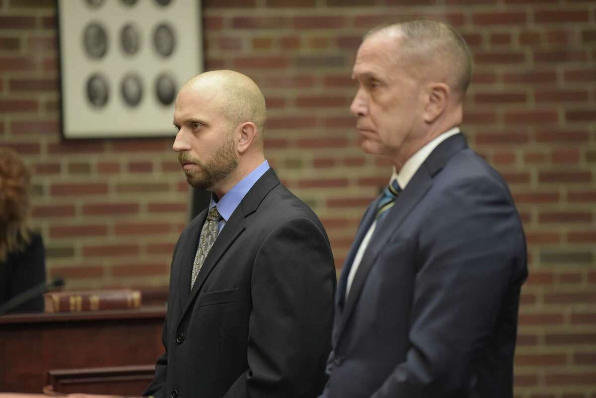 Eric Rosenbrock, left, appears with his attorney, David Taffany, during his sentencing on Monday, Nov. 18, 2019, in Ballston Spa, N.Y. Rosenbrock, who pleaded guilty to a charge of criminally negligent homicide, was sentenced to five years of probation for accidentally killing his wife, Ashley Rosenbrock, while he was cleaning his gun. (Paul Buckowski/Times Union)