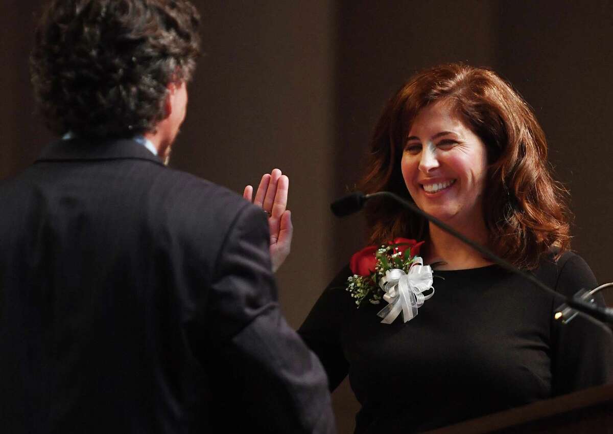 Milford mayor, board members take the oath in upbeat ceremony