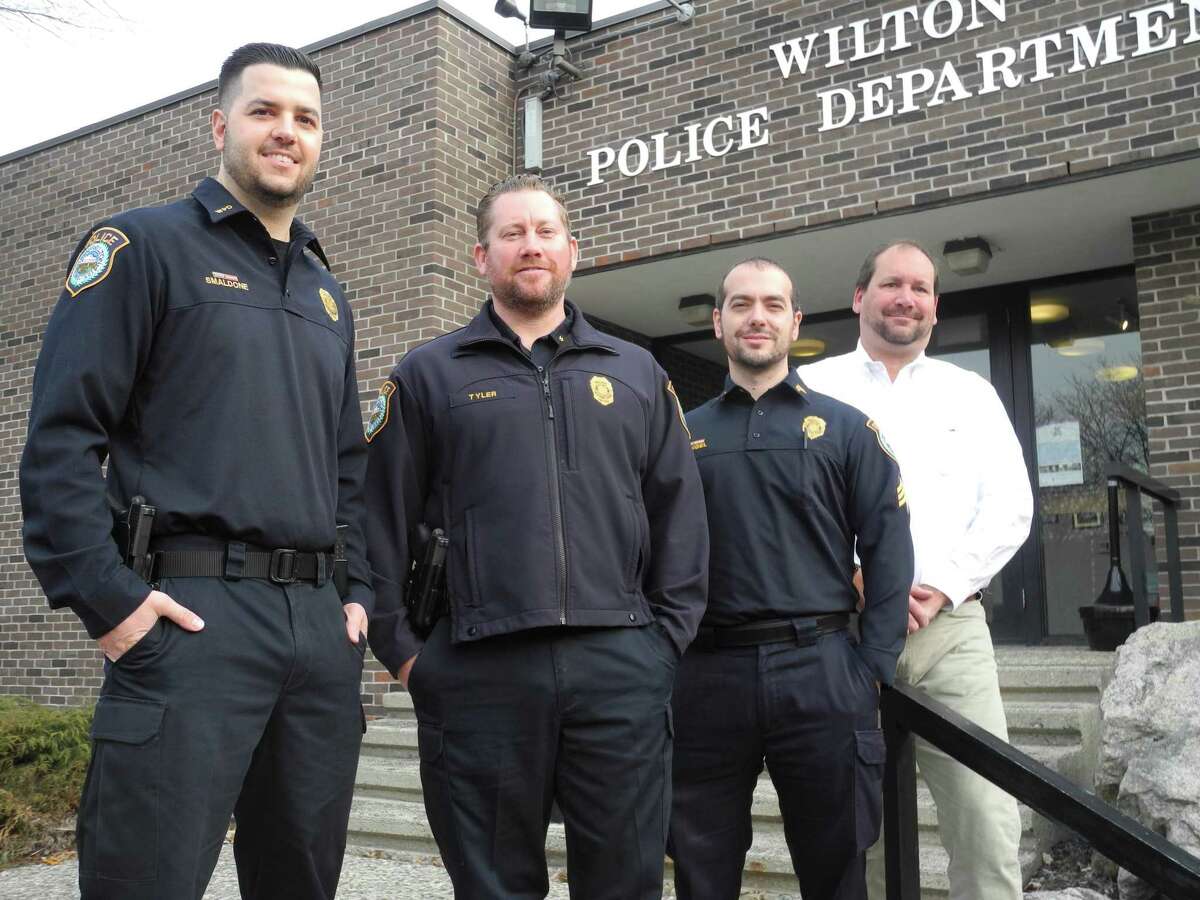 Wilton police taking part in No Shave November are, from left, Officer Robert Smaldone, Training Officer Michael Tyler, Sgt. Steven Rangel, and Detective Scott Sear at police headquarters on Nov. 14.
