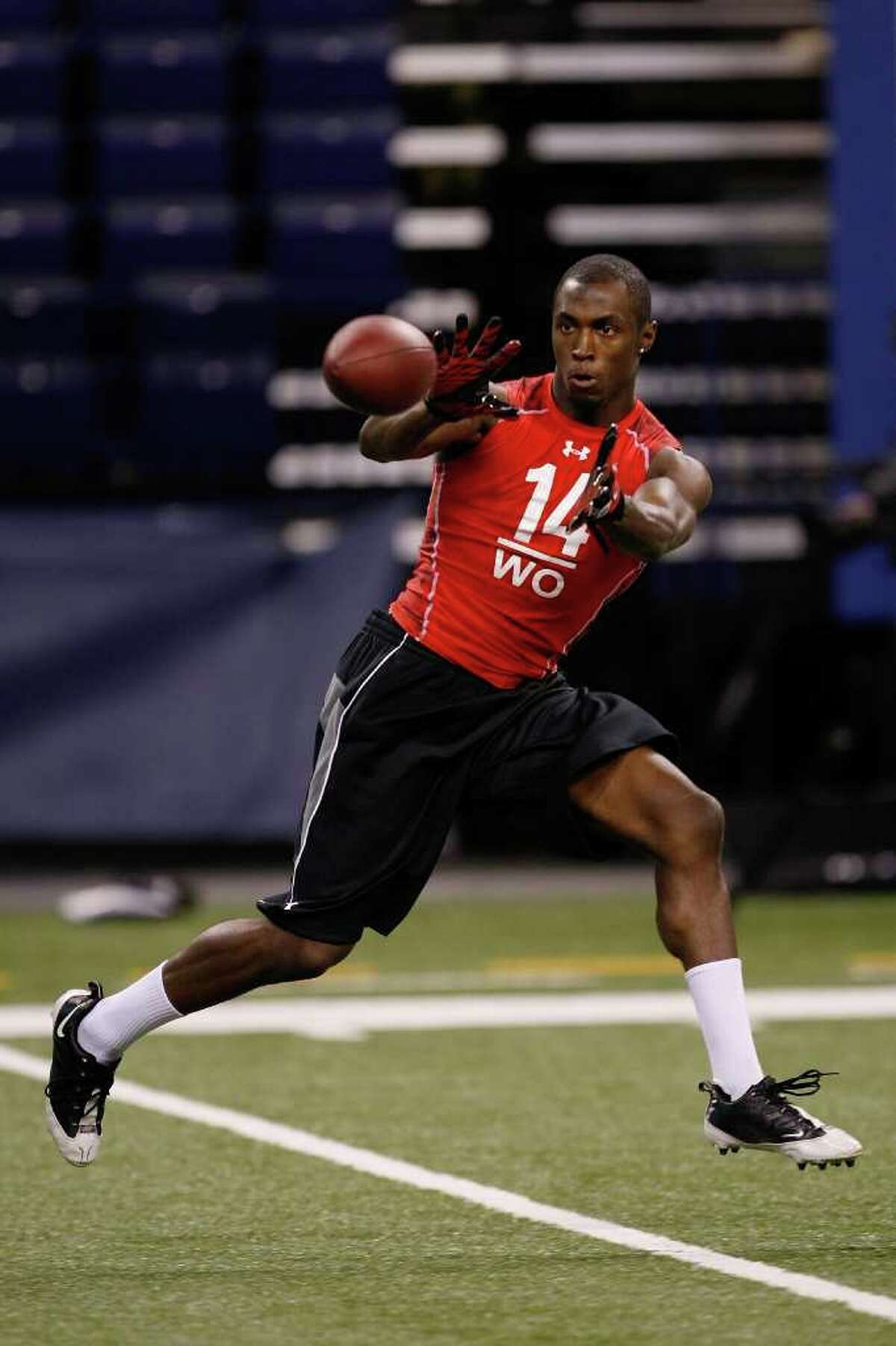 INDIANAPOLIS, IN - FEBRUARY 28: Wide receiver Marcus Easley of Connecticut catches the football during the NFL Scouting Combine presented by Under Armour at Lucas Oil Stadium on February 28, 2010 in Indianapolis, Indiana. (Photo by Scott Boehm/Getty Images) *** Local Caption *** Marcus Easley