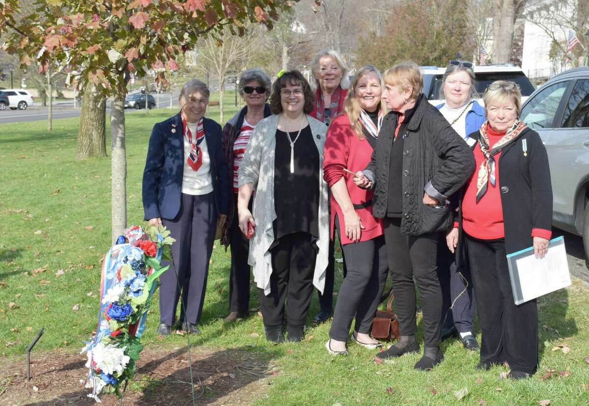 The Roger Sherman Chapter, Daughters of the American Revolution dedicated a plaque to Vietnam veterans beneath a tree they planted this spring in honor of Vietnam veterans. The ceremony took place on Veterans Day, Nov. 11. Above are, from left to right, Heidi Norcross, Jennie Rehnberg, Tricia Gregory and Bonnie Butler and, in back, Pat Pavlick, Mary Schenzer, Katy Francis and Marcella Martin.